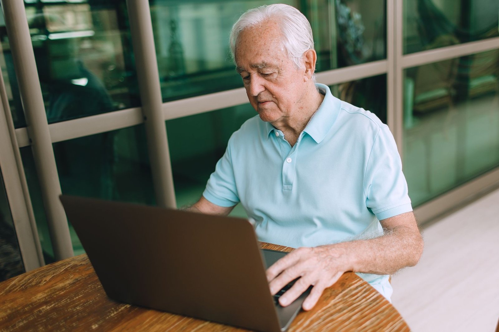 Veteran signing in to his VA My HealtheVet account for veterans on a laptop at home