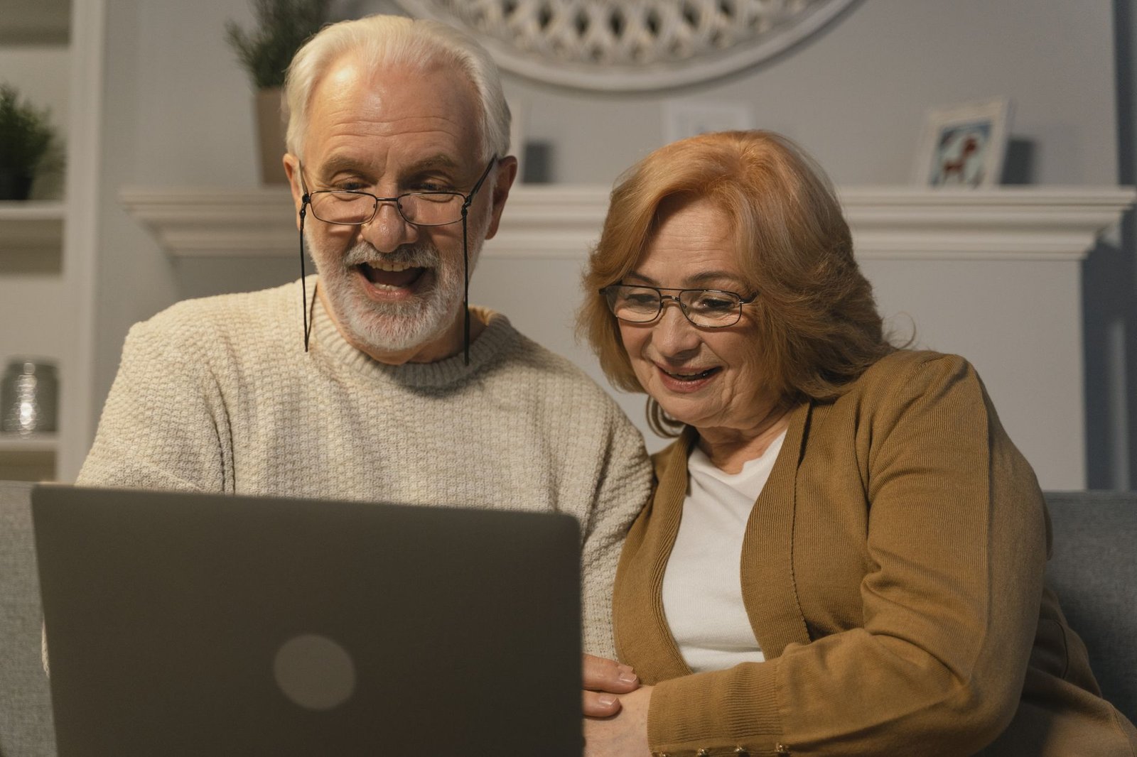 Veteran and spouse joining a telehealth consultation to review a mesothelioma diagnosis at home
