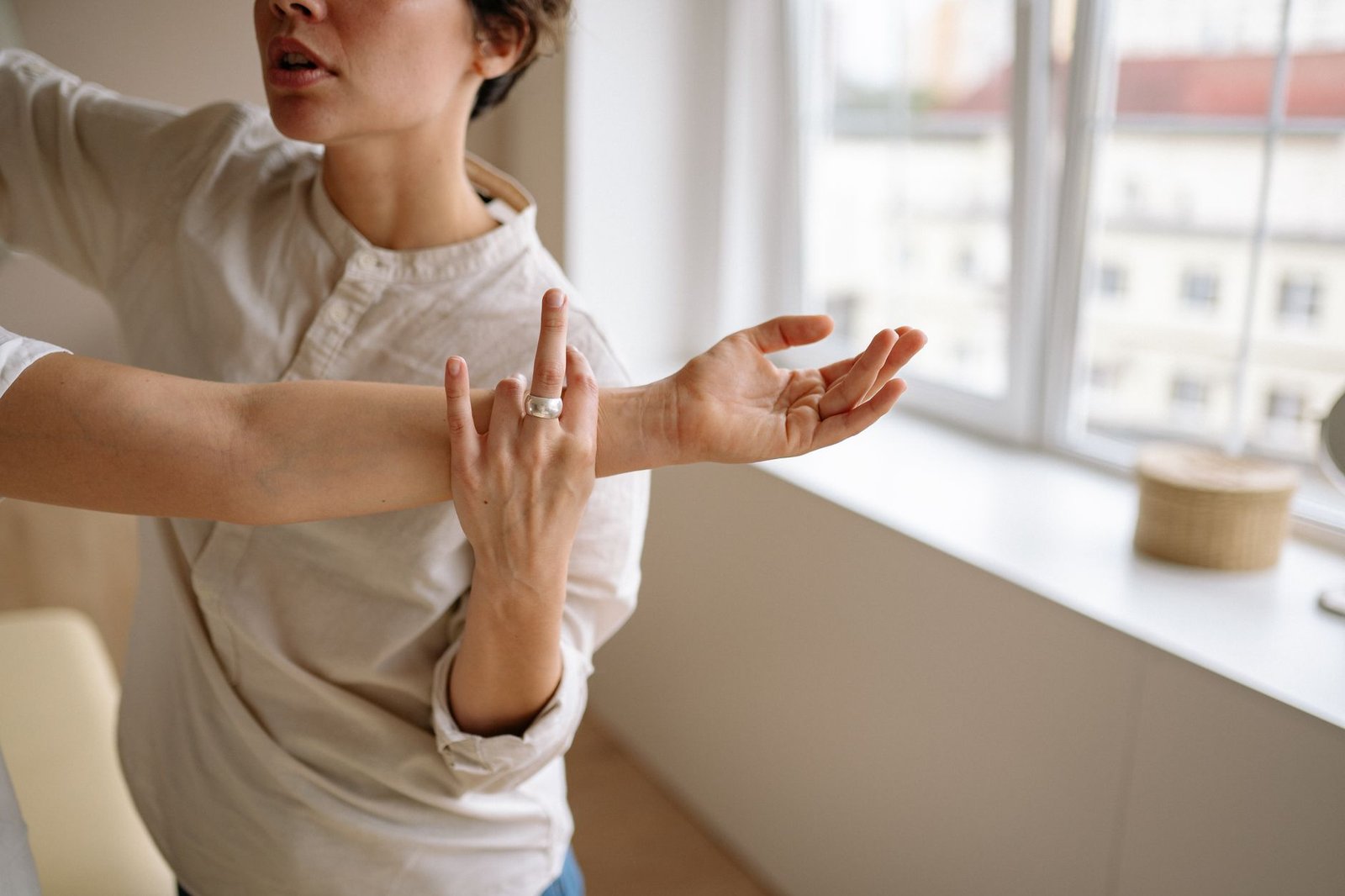 A therapist guides gentle shoulder exercises as part of rehab after mesothelioma surgery